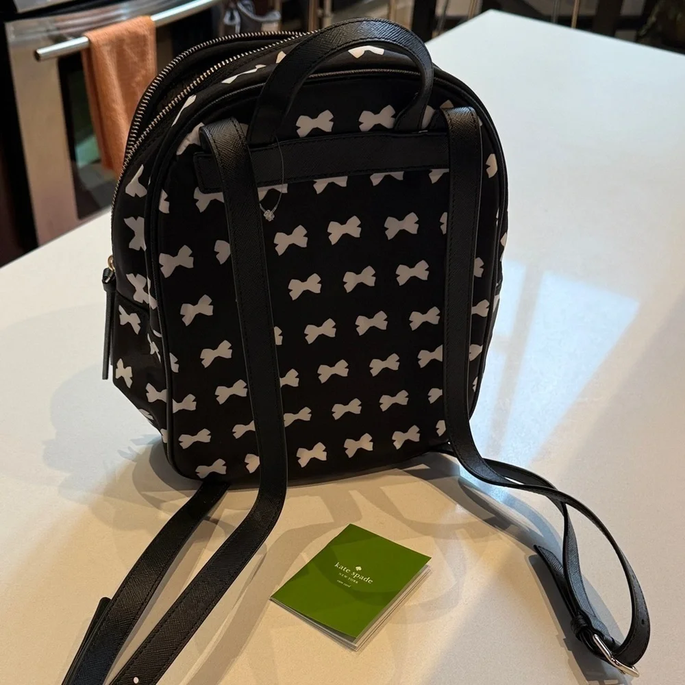 🆕 Kate Spade NWOT Wilson Road Bradley Bow Pattern Backpack, Black and White, Sm
